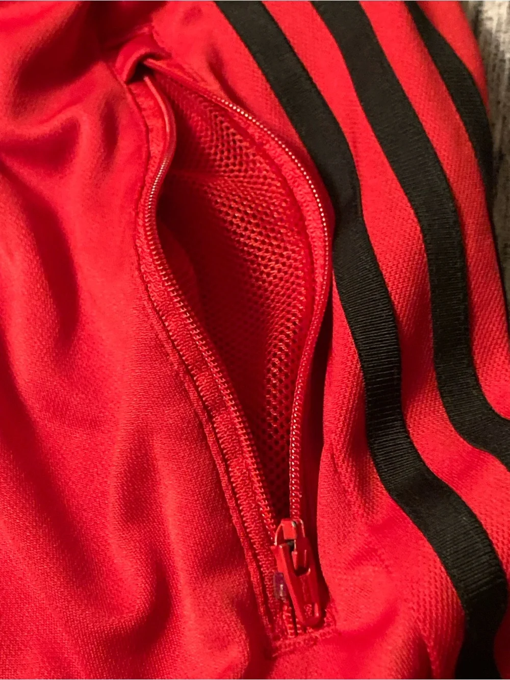 adidas Red Athletic Shorts with Black Side Stripes